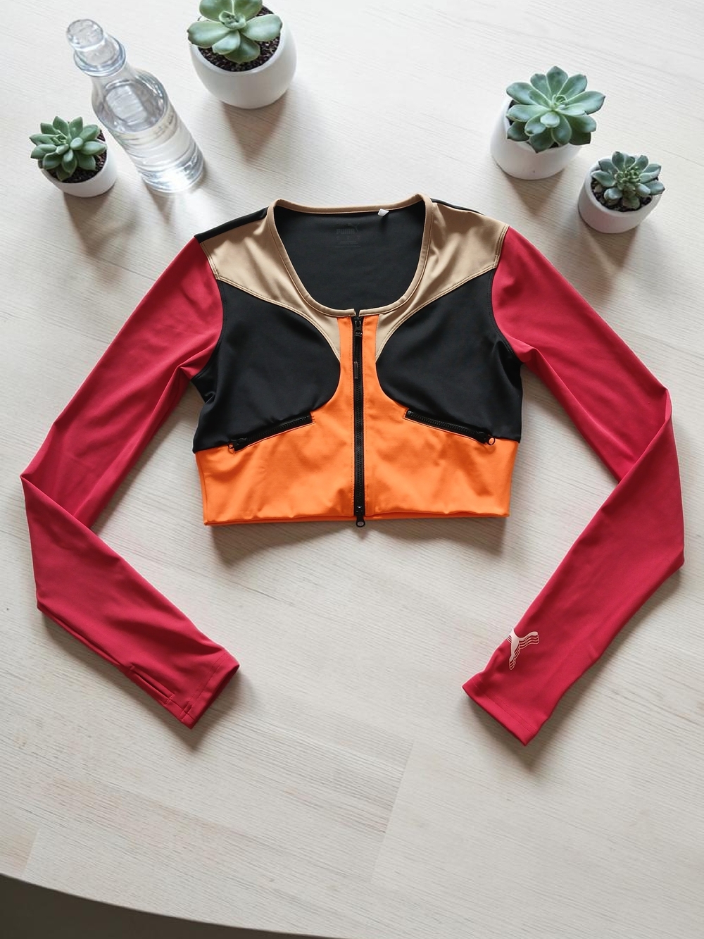 PUMA High-court Unity crop top with versatile dual front zip